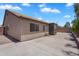 Backyard with brick pavers and block wall fencing offering privacy at 7551 W Pasadena Ave, Glendale, AZ 85303