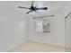 Bedroom with ceiling fan and mirrored closet doors at 7551 W Pasadena Ave, Glendale, AZ 85303