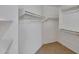 Walk-in closet with built in shelves and storage racks at 7551 W Pasadena Ave, Glendale, AZ 85303