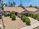 Charming single-story home with desert landscaping and a tile roof at 7551 W Pasadena Ave, Glendale, AZ 85303