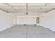 Clean, spacious garage with ample storage and water heater at 7551 W Pasadena Ave, Glendale, AZ 85303