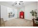 Bedroom featuring neutral walls, a ceiling fan, and a red cabinet at 10322 E Topaz Ave, Mesa, AZ 85212