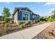 Beautiful home exterior with a manicured front yard and well-maintained landscaping at 10322 E Topaz Ave, Mesa, AZ 85212