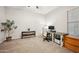 Office space featuring neutral walls, a window with blinds, and ceiling fan at 10322 E Topaz Ave, Mesa, AZ 85212