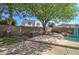 A refreshing pool, lush green grass, and ample patio space create an outdoor oasis perfect for relaxation and entertaining at 10402 E Javelina Ave, Mesa, AZ 85209