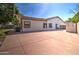 Enjoy outdoor living with a basketball hoop and storage, all set on a large concrete patio perfect for entertainment at 10402 E Javelina Ave, Mesa, AZ 85209