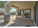 Covered backyard patio area with a clear view of the pool and outdoor living space at 10402 E Javelina Ave, Mesa, AZ 85209