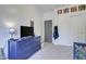 This bedroom features bright white walls, carpet flooring and a dark blue dresser at 10402 E Javelina Ave, Mesa, AZ 85209