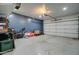 Spacious two-car garage with ample room for parking and storage at 10402 E Javelina Ave, Mesa, AZ 85209
