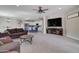 Open-concept living room that flows into the dining and kitchen areas at 10402 E Javelina Ave, Mesa, AZ 85209