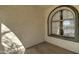 Covered porch with stucco walls, window, and concrete flooring at 10402 E Javelina Ave, Mesa, AZ 85209