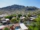 Stunning aerial view showcases a charming home nestled near picturesque mountains at 10424 N 7Th Pl # 2, Phoenix, AZ 85020