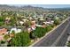 A sprawling residential area featuring lush trees and attractive homes nestled amongst serene mountains at 10424 N 7Th Pl # 2, Phoenix, AZ 85020