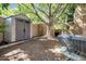 Backyard includes shed, tree providing ample shade, and an outdoor sitting area at 10424 N 7Th Pl # 2, Phoenix, AZ 85020