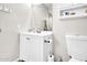 Bathroom with white vanity, modern faucet, mirror, medicine cabinet, and toilet at 10424 N 7Th Pl # 2, Phoenix, AZ 85020