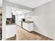 Updated kitchen with white cabinets, countertops, and modern appliances at 10424 N 7Th Pl # 2, Phoenix, AZ 85020