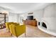 Spacious living room with a fireplace and natural light at 10424 N 7Th Pl # 2, Phoenix, AZ 85020