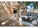 Outdoor patio features comfortable seating, a wall-mounted TV, and a grill, perfect for entertaining at 10424 N 7Th Pl # 2, Phoenix, AZ 85020