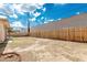 Expansive backyard area featuring wood fence and potential for creative landscaping at 1512 W Crescent Ave, Mesa, AZ 85202