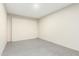 Clean unfinished basement with concrete floors and white walls at 1512 W Crescent Ave, Mesa, AZ 85202