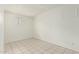 Bright bedroom with tile floors, and a window at 1512 W Crescent Ave, Mesa, AZ 85202
