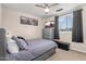 Tranquil bedroom features a window, dresser, and stylish decor elements at 1574 E Scott Ave, Gilbert, AZ 85234