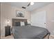 Spacious bedroom offers a ceiling fan, closet, and a cozy place to rest at 1574 E Scott Ave, Gilbert, AZ 85234
