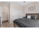 A calm bedroom with a queen bed, a large closet, and neutral decor at 1574 E Scott Ave, Gilbert, AZ 85234