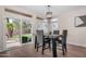 Bright dining room with sliding door access to backyard at 1574 E Scott Ave, Gilbert, AZ 85234