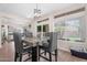 Dining area is open to the kitchen and features backyard views at 1574 E Scott Ave, Gilbert, AZ 85234