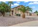 Desert landscaped home featuring a two car garage, and gated front entry at 1574 E Scott Ave, Gilbert, AZ 85234