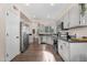 Modern kitchen with stainless steel appliances, ample counter space, and wood floors at 1574 E Scott Ave, Gilbert, AZ 85234