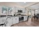 Well-lit kitchen with stainless steel appliances, and ample counter space at 1574 E Scott Ave, Gilbert, AZ 85234