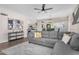 Comfortable living room area with a view of the kitchen and backyard access at 1574 E Scott Ave, Gilbert, AZ 85234
