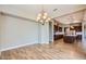Open-concept dining room with views into the gourmet kitchen at 16729 W Alvarado Dr, Goodyear, AZ 85395
