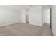 Spacious main bedroom leads to a bath with walk-in shower at 18262 W La Senda Dr, Surprise, AZ 85387