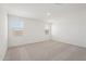 Spacious bedroom with neutral carpet, natural light and neutral paint at 18262 W La Senda Dr, Surprise, AZ 85387