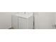 Laundry room featuring a white washer and dryer set for convenient and efficient laundry care at 18262 W La Senda Dr, Surprise, AZ 85387