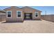 Backyard with sliding glass doors at 18268 W La Senda Dr, Surprise, AZ 85387
