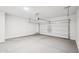 Spacious garage with plenty of room for parking and storage at 18268 W La Senda Dr, Surprise, AZ 85387