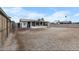 Spacious, low-maintenance backyard featuring gravel and a covered patio, perfect for outdoor entertaining at 2002 W Windrose Dr, Phoenix, AZ 85029