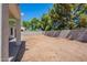 A large backyard with a covered patio and a block wall, offering a private and spacious outdoor area at 2024 W Darrel Rd, Phoenix, AZ 85041