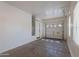 Spacious garage with concrete floors and white walls, plus an automatic door and room for storage at 2024 W Darrel Rd, Phoenix, AZ 85041