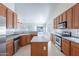 Spacious kitchen and living room combo features plentiful storage and open concept to the Gathering room at 2024 W Darrel Rd, Phoenix, AZ 85041