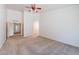 Spacious living room with neutral walls and flooring and ample natural light at 2024 W Darrel Rd, Phoenix, AZ 85041