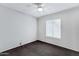 Bedroom with a fan and natural light through a window at 3106 S Extension Rd, Mesa, AZ 85210