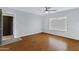 Bright bedroom features a window and sleek wood flooring at 3106 S Extension Rd, Mesa, AZ 85210