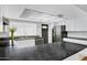 Kitchen boasts updated countertops, modern appliances and stylish lighting at 3106 S Extension Rd, Mesa, AZ 85210