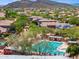 Beautiful aerial view of neighborhood highlighting community pools and solar panels at 35314 N 31St Ave, Phoenix, AZ 85086