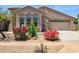 Charming single-Gathering home featuring desert landscaping, a two-car garage, and beautiful stucco architecture at 35314 N 31St Ave, Phoenix, AZ 85086